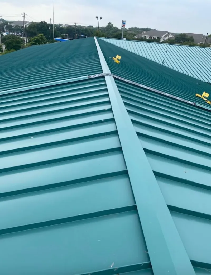 Green commercial metal roof ridge and valley for Metal Roof Repair in Marrero