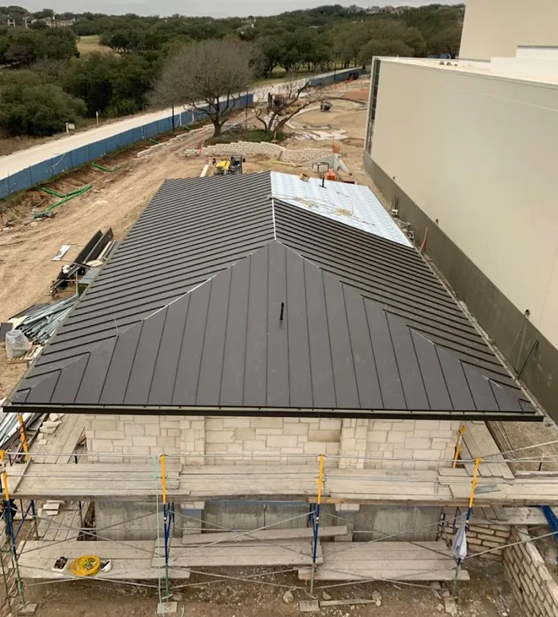 Metal roof new construction with scaffolding in Marrero